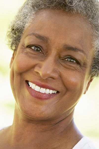 woman smiling with dentures from Universal Dentistry in Bensalem, PA