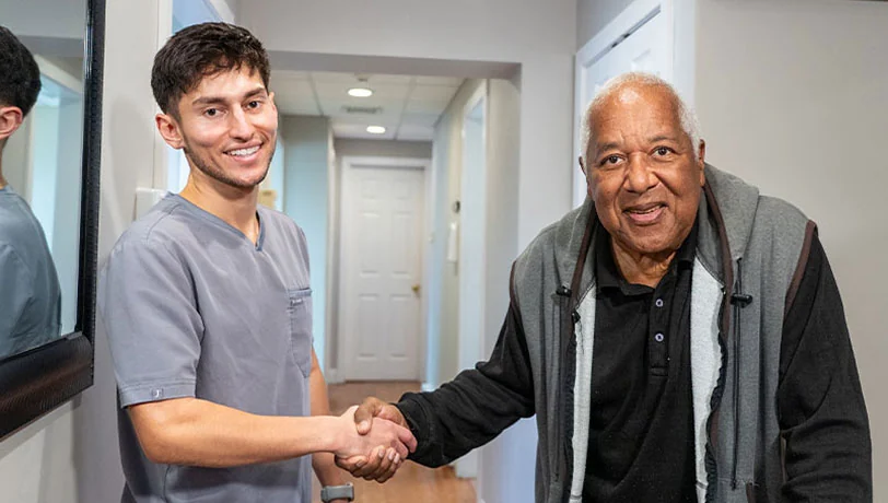 patient smiling during his visit to Bensalem dental office Universal Dentistry