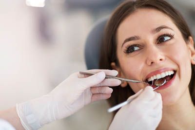 woman getting dental care at Universal Dentistry in Cherry Hill, NJ