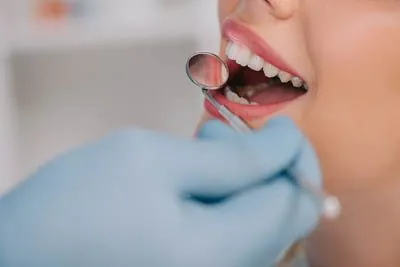 closeup of a patient receiving periodontal care at Universal Dentistry in Cherry Hill, NJ