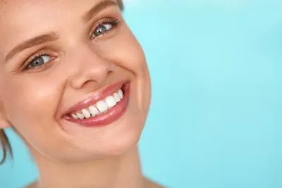 woman smiling after getting her teeth whitened at Universal Dentistry in Cherry Hill, NJ