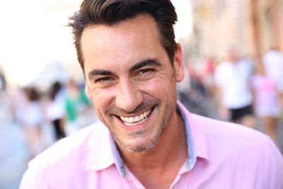 man smiling after visiting Universal Dentistry in Cherry Hill, NJ