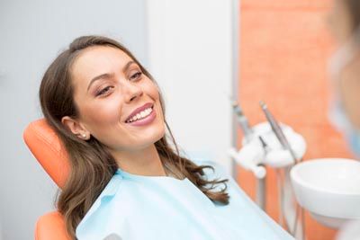 woman laying back in the dental chair at Universal Dentistry in North Wales, PA