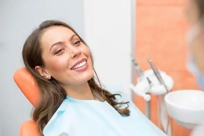 woman laying back in the dental chair at Universal Dentistry in North Wales, PA