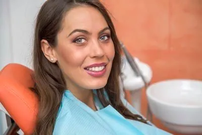 woman smiling during her visit to Universal Dentistry in Springfield, PA