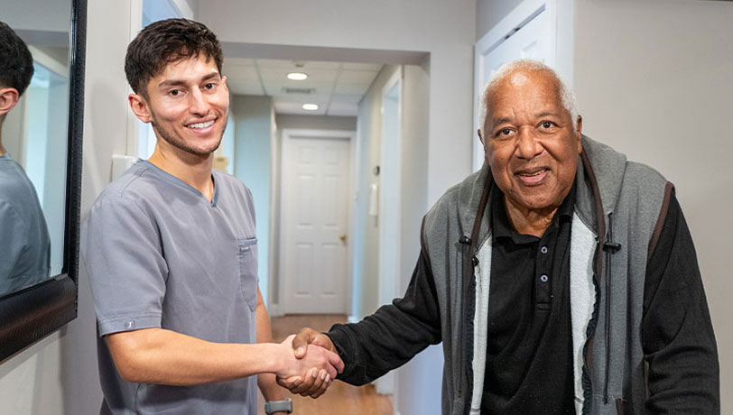 man smiling during his visit to Turnersville dental office Universal Dentistry