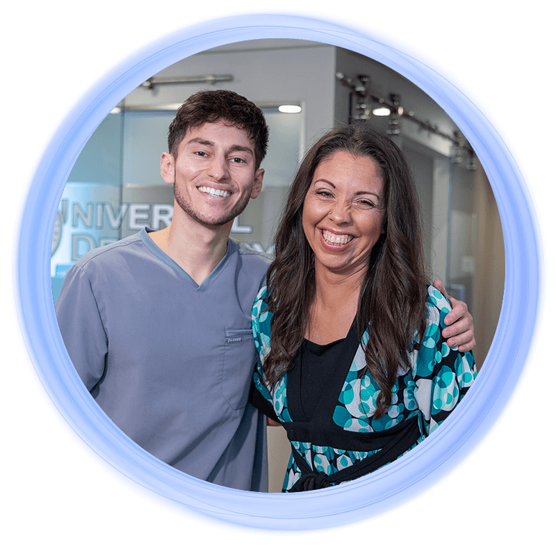 patient and doctor smiling together