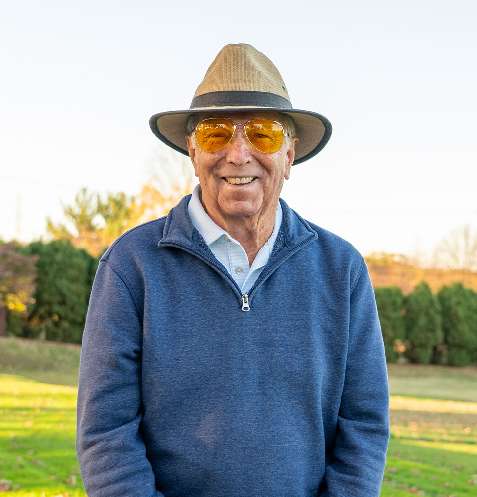 joe golfing after new dental implants